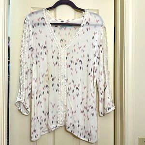 Dressy slitted sleeved top